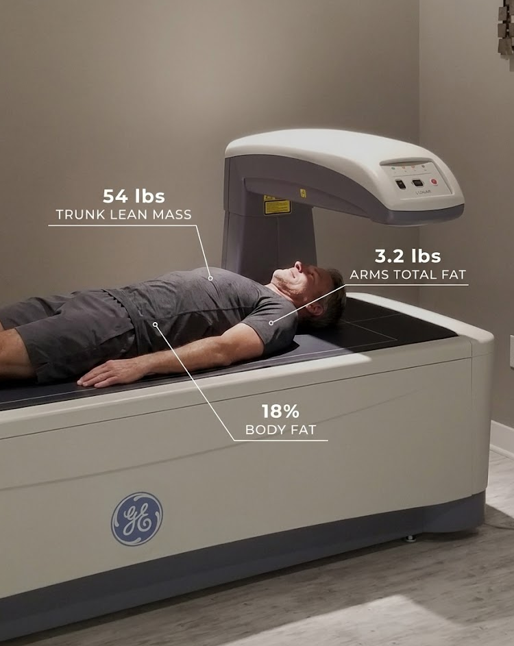 A DEXA body composition scan in progress at DexaFit Denver
